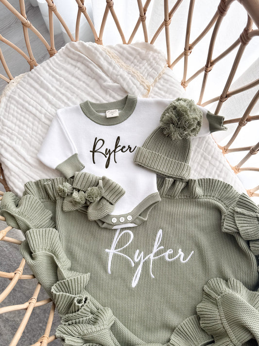Green trim personalised baby romper