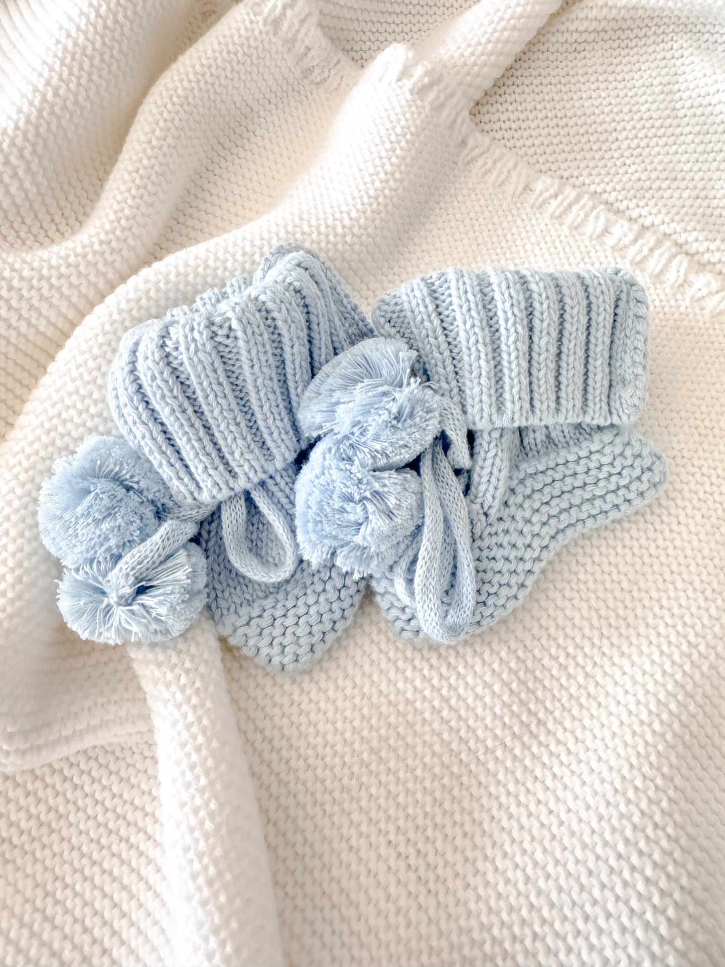 Blue knit baby pompom booties