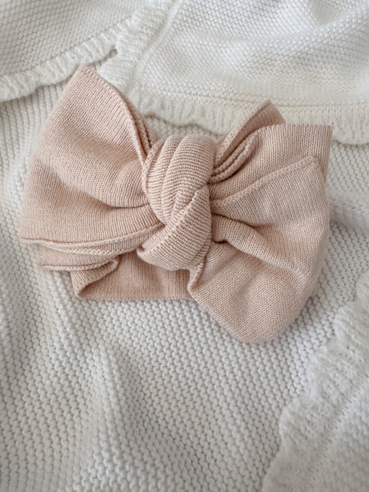 Beige baby bow