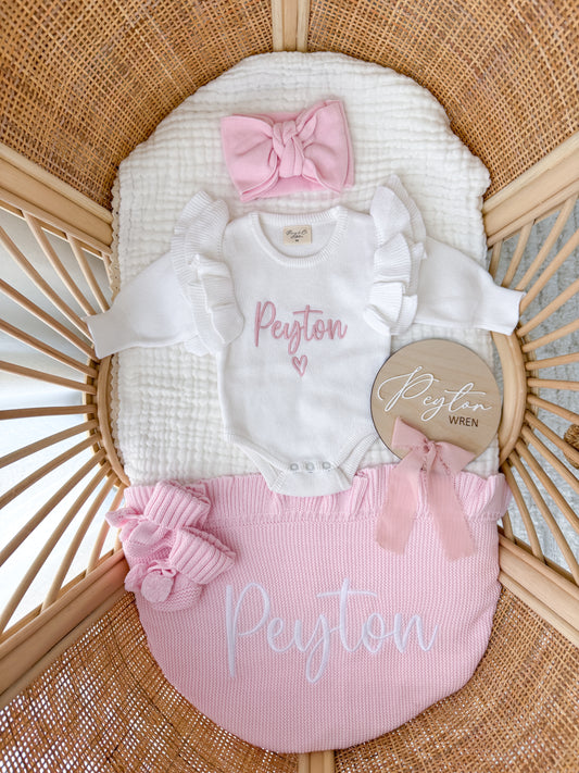 White frill heart baby name announcement romper