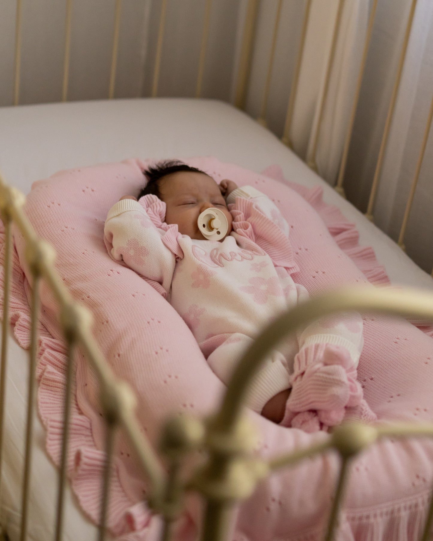 Pink pointelle frill baby blanket