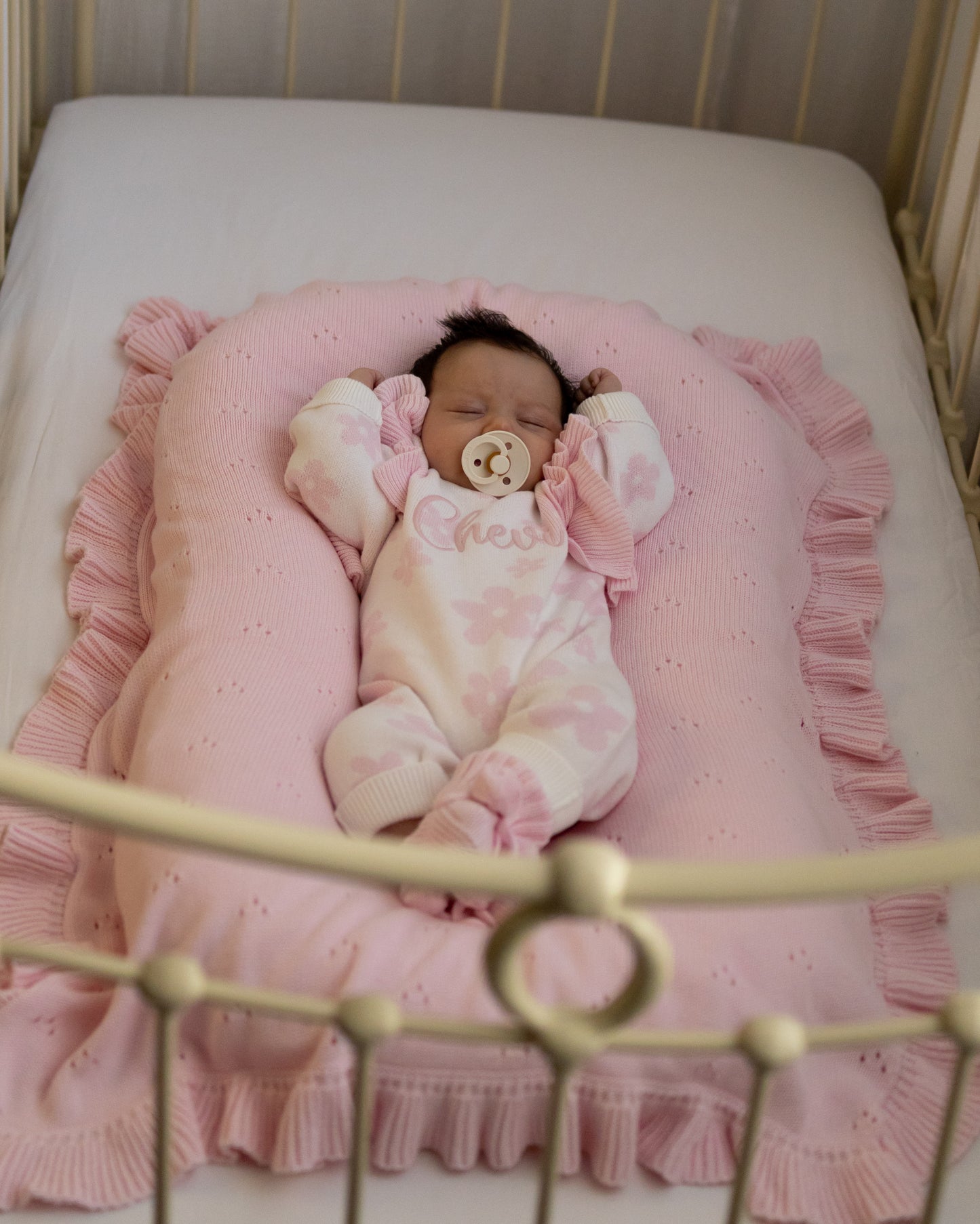 Pink pointelle frill baby blanket
