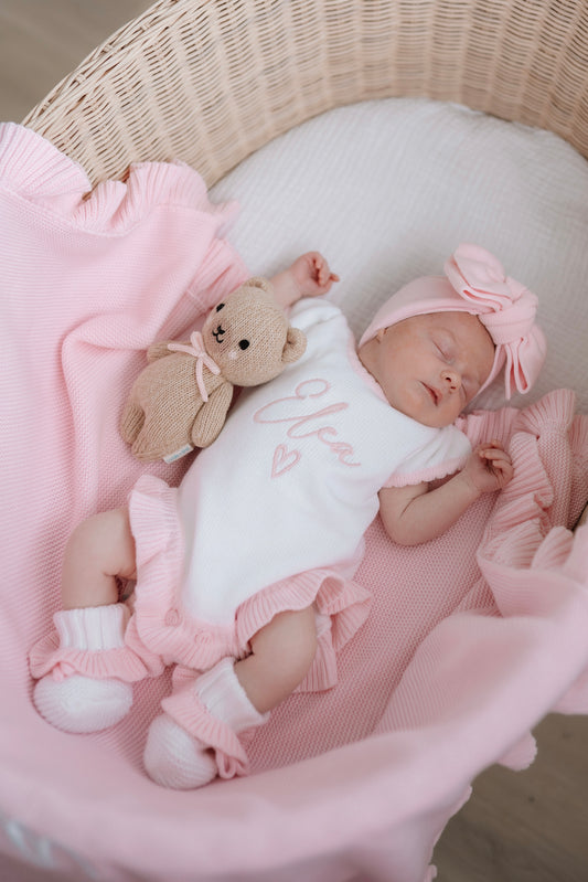 White and pink scallop frill leg baby announcement outfit